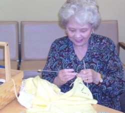Sewing Circle:  Ann knitting